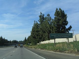 California 41 through Fresno is known as the Yosemite Freeway but is also designated as the Dwight D. Eisenhower Memorial Freeway in honor of the 34th U.S. President who was responsible for the passage of the Federal Aid Highway Act of 1956 (National Interstate and Defense Highways Act), which created the modern Interstate Highway system. It is ironic that President Eisenhower is honored on a non-Interstate highway in the largest city in the United States not served by an Interstate Highway.