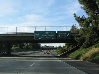 Northbound California 41 meets Exit 127, Tulare Street. The next interchange along California 41 (Yosemite Freeway) is Exit 128, California 180 (Kings Canyon Freeway).