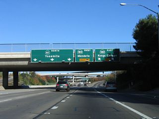 Northbound California 41 (Eisenhower / Yosemite Freeway) reaches Exit 128A, California 180 (Sequoia-Kings Canyon Freeway) east to Kings Canyon National Park. Use California 180 east to California 168 northeast to California State University at Fresno (CSUF). The next exit is for Exit 128B, California 180 (Kings Canyon Freeway) east to Mendota. The California 180 freeway east of here was opened in the early 2000s and is slated for further extension east as development and traffic needs warrant.