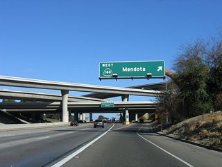 Immediately thereafter, northbound California 41 meets Exit 128B, California 180 (Sequoia-Kings Canyon Freeway) west to Mendota. California 180 links with California 99 west of here, then eventually reverts to a conventional two-lane highway to Mendota. Plans call for an eventual extension of California 180 east to link with Interstate 5 in the future, perhaps as a two-lane facility or as an expressway.