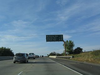 This mileage sign provides the distance to the next three interchanges along California 41 (Eisenhower / Yosemite Freeway): Exit 129, McKinley Avenue; Exit 130, Shields Avenue; and Exit 131, Ashlan Avenue.