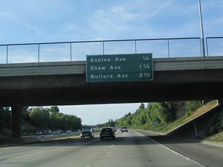 This mileage sign provides the distance to the next three interchanges along California 41 (Eisenhower / Yosemite Freeway): Exit 131, Ashlan Avenue; Exit 132, Shaw Avenue (former California 168); and Exit 133, Bullard Avenue.