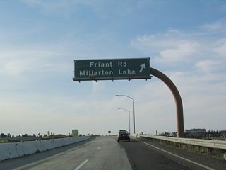Northbound California 41 (Eisenhower / Yosemite Freeway) reaches Exit 135, Friant Road north and Blackstone Avenue south. Blackstone Avenue is the old alignment of California 41 leading into Fresno from the north.