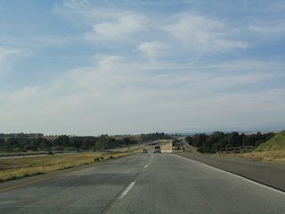 California 41 (Eisenhower / Yosemite Freeway) reduces to two northbound lanes.