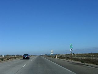 A California 41 north reassurance shield is posted after the Floral Avenue intersection.