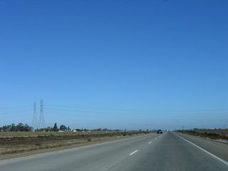A set of Pacific Gas and Electric power lines cross over California 41 between Floral Avenue and Manning Avenue.
