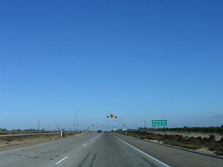 The next intersection along California 41 (Yosemite Freeway) north is with Manning Avenue. Use Manning Avenue east to Bowles, Parlier, and Reedley. To the west, Manning Avenue travels to Raisin City, San Joaquin, and a junction with Interstate 5 Exit 365 in the west valley. This is a major east-west arterial across Fresno County.