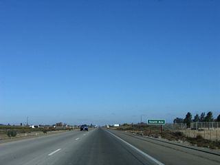 The next intersection along California 41 (Yosemite Freeway) north is with South Avenue, approximately 1.5 miles north of the Manning Avenue intersection.