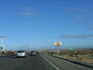 A California 41 north reassurance shield is posted thereafter, right as the highway narrows from two northbound lanes to one.