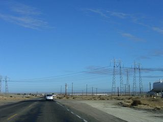 Path 15, which carries power between Southern and Northern California, parallels Interstate 5 and the California Aqueduct. Near Kettleman City, California 41 passes under these 500kV power lines, which are owned and operated by Pacific Gas and Electric (PG&E).