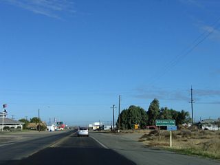 Soon thereafter, California 41 enters the unincorporated community of Kettleman City (population 1,499 as of 2000 Census, elevation 253 feet).