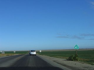 A California 41 north reassurance shield is posted thereafter. Agricultural lands (farms, ranches, and orchards are visible in all directions).