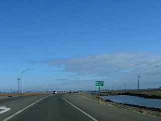 Nevada Avenue, another east-west county route, was littered with cotton at the time of these photos.
