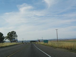 The next signalized intersection along California 41 north is with California 145 west to Madera on the California 99 corridor.