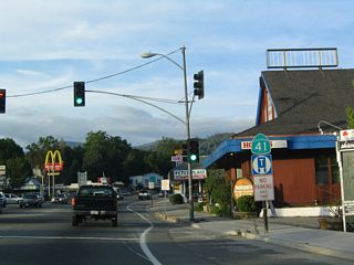 A California 41 reassurance shield is posted at the intersection with California 49. California 41 continues north into the southern entrance to Yosemite National Park.