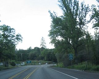 Northbound California 41 approaches Road 620 / Bassett Station Road west.