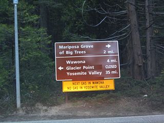 Wawona Road approaches Mariposa Grove Road. Turn right to the Mariposa Grove of Big Trees or left to follow Wawona Road north to Wawona and Yosemite Valley.