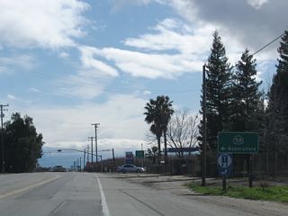 Southbound California 43 and eastbound California 58 split just a short distance south of the power line crossing. California 58 turns east toward Rosedale and Bakersfield, while California 43 proceeds south toward its junction with California 119 en route to Taft.