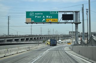 SR 47 continues north along the Alameda Corridor to I-405 (San Diego Freeway) by Lincoln Village. SR 103 (Terminal Island Freeway) turns northeast by an oil refinery complex to SR 1 (Pacific Coast Highway).