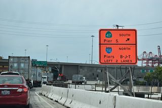 SR 103 ends at the south service road for Ocean Boulevard. The service road connects with both Pier T Avenue and Interstate 710 (Long Beach Freeway) northbound to Downtown Long Beach.