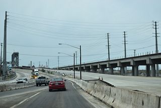 Construction upgrading the Terminal Island Freeway south from Henry Ford Avenue got underway by 2012 and continued to 2025.