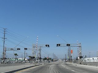 Another railroad meets SR 47 at this at-grade crossing. One of the needs of the replacement Port Access Expressway would be to eliminate at-grade crossings along this stretch of Henry Ford Avenue, as well as create a reliable alternate route for trucks on roads other than I-710 and I-110.