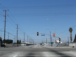 Anaheim Street crosses SR 47 (Henry Ford Avenue) west from industrial areas of Long Beach to Wilmington in Los Angeles.