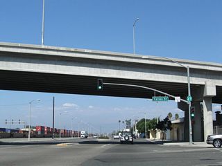 Alameda Street north meets Carson Street at a grade separated intersection.