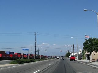 Dominguez Street stems east from Alameda Street to Santa Fe Avenue by an area of distribution centers and warehouses. A discontinous section of Dominguez Street lies west of the parallel Amameda Corridor.