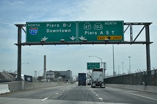 East beyond Navy Way, SR 47 leave the city of Los Angeles and enters the city of Long Beach east. Interstate 710 (Long Beach Freeway) next overtakes the freeway mainline from SR 47 (Ocean Boulevard) east to Downtown Long Beach and north to Pasadena.