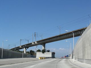 SR 47 next passes under the Metro Blue Line, which provides a light rail connection between Union State in Downtown Los Angeles and Long Beach at Long Beach Boulevard and First Street just north of the convention center.