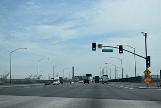 Navy Way stems south from the traffic light with SR 47 (Seaside Avenue) to Terminal Way and port facilities along San Pedro Bay.