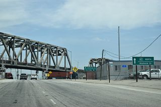 The alignment taking SR 47 north along Henry Ford Avenue was meant to be temporary pending completion of the Port Access Expressway.