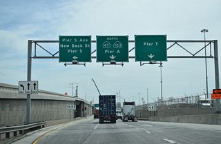 SR 47 overlaps with SR 103 north along the Terminal Island Freeway, which extends north through the Port of Los Angeles and industrial areas to Willow Street in Long Beach.