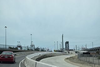 SR 47/103 (Terminal Island Freeway) overlap south to Terminal Island via the Commodore Schuyler F. Heim Bridge.