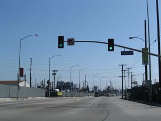 Henry Ford Avenue intersects Denni Street just after SR 47 separates from Alameda Street.