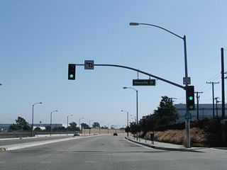 The first SR 47 south reassurance shield was posted at the signalized intersection with Manville Street. The sign was removed by 2025.