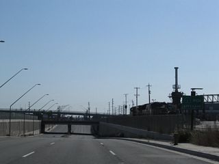 SR 47 passes under another railroad overcrossing ahead of the O Street connector to SR 1 (Pacific Coast Highway).