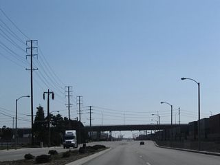 The next major intersection along SR 47 (Alameda Street) south is with the access road to Sepulveda Boulevard. Sepulveda Boulevard joins Carson with Torrance and Willow Street east into Long Beach.
