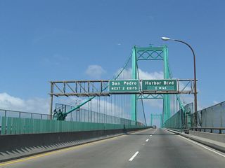 Exit 1 C joins the west end of the Vincent Thomas Bridge with Harbor Boulevard at Swinford Street across from the Los Angeles World Cruise Center.