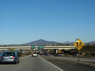Unlike westbound California 54, there is no access from California 54 east to Old U.S. 101 (Broadway). Use Exit 1 to make connections to the local street grid in National City and Chula Vista. Perspectives show the freeway&#039;s beginning from the transition ramps from Interstate 5 south and north.