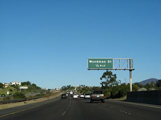 The next exit along California 54 (Filipino-American Highway) is Exit 4, Woodman Street, one-half mile.