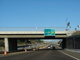 The next exit along eastbound California 54 is Exit 6, Toll California 125 south to Chula Vista (Eastlake and Otay Ranch) and the Otay Mesa International Border Crossing. There is no direct access to Sweetwater Road, despite the former presence of a traffic signal near this location. To Sweetwater Road, use either Exit 5 or Exit 7.