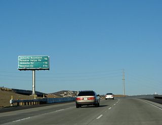 The next exit along eastbound California 54 is California 125's Exit 12, San Diego County S-17 (Jamacha Boulevard) east and Paradise Valley Road. The other exits listed on this interchange sequence sign are found along California 125 north as it passes through unincorporated Spring Valley.