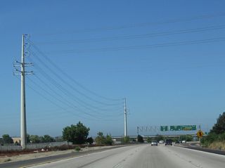 Relocated 69kV San Diego Gas & Electric power lines cross over the freeway.