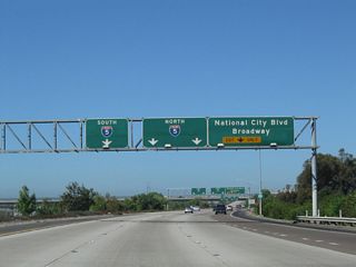 The right lane of California 54 west becomes exit only for Exit 1C, National City Boulevard north and Broadway south. These two streets are both part of the historic route U.S. 101 took through National City and Chula Vista, respectively.