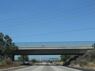 California 54 passes under Highland Avenue and Fourth Avenue.