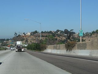 A California 54 west reassurance shield is posted after the Reo Street interchange.