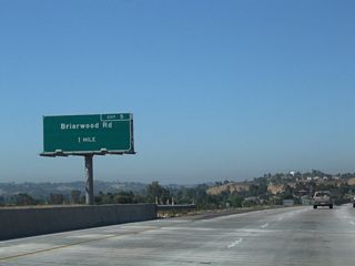 After separating from California 125 at Exit 6, the next exit along westbound California 54 is Exit 5, Briarwood Road (one mile).