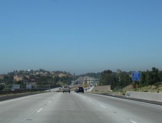 Traffic from California 125 north merges onto California 54 west. Under construction for several years in the early to mid 2000s, the interchange between California 54 and California 125 was fully opened to traffic in late 2007.